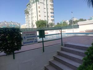 Bazén v ubytovaní CANCÚN III Solo Familias Serviplaya alebo v jeho blízkosti