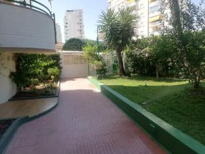 Vonkajšia záhrada v ubytovaní CANCÚN III Solo Familias Serviplaya