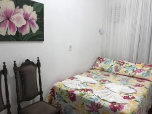Cama ou camas em um quarto em Yellow Hostel Praia da Costa