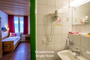 Ванна кімната в Hotel Hirschen - Grindelwald