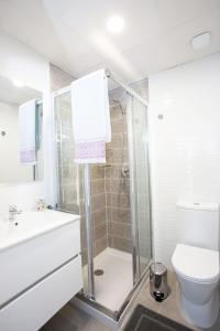 a bathroom with a shower and a toilet at Calpe Beach in Calpe