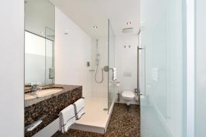 Koupelna v ubytování ACHAT Hotel München Süd