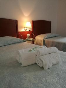Cama o camas de una habitación en HOTEL PRINCIPE
