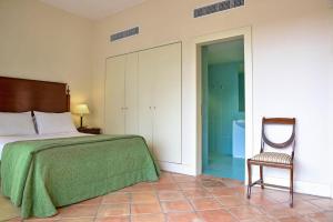Ένα ή περισσότερα κρεβάτια σε δωμάτιο στο Villa Termal Spa Hotel - Villa Termal Spa Resort - by Unlock Hotels