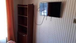 TV a/nebo společenská místnost v ubytování Cabaña Horcon