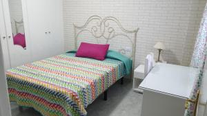 Posteľ alebo postele v izbe v ubytovaní CanariasBrisaMar - Apartamento