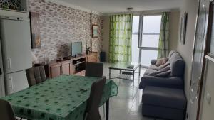 Televízia a/alebo spoločenská miestnosť v ubytovaní CanariasBrisaMar - Apartamento