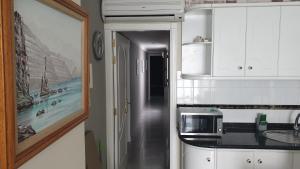 Kuchyňa alebo kuchynka v ubytovaní CanariasBrisaMar - Apartamento