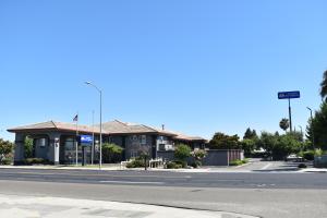 a building on the side of a street at Americas Best Value Inn Manteca in Manteca