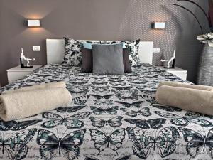 Кровать или кровати в номере Luxury Townhouse