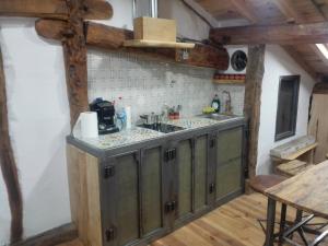 Küche/Küchenzeile in der Unterkunft La plazuela verde