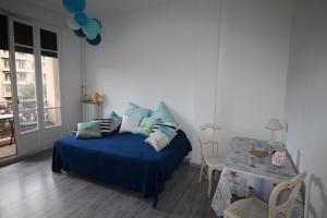 Ein Bett oder Betten in einem Zimmer der Unterkunft Le Lagon Marseillais