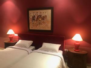 Llit o llits en una habitació de Villa Dar Jbila Tanger