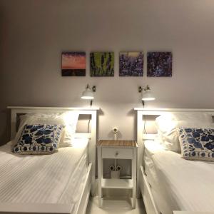 A bed or beds in a room at Mehmet Bey Suites