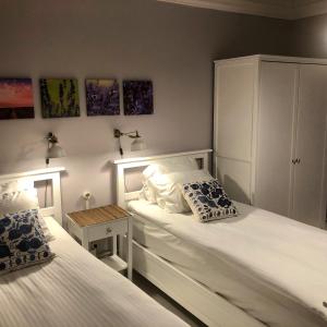 A bed or beds in a room at Mehmet Bey Suites