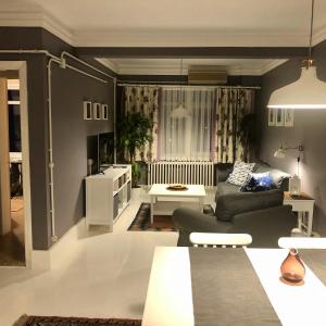 A bed or beds in a room at Mehmet Bey Suites