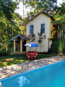 A piscina localizada em Pousada Arboretum ou nos arredores