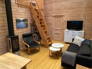 TV a/nebo společenská místnost v ubytování Ferienhaus Stenbäcken in Mittelschweden