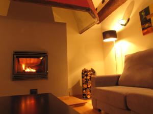 A seating area at Hotel Portal Del Matarraña