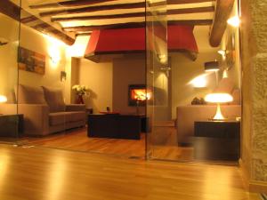 A seating area at Hotel Portal Del Matarraña