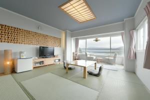 TV a/nebo společenská místnost v ubytování Hotel Ra Kuun