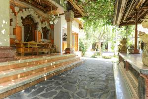Fotografie z fotogalerie ubytování The Legian Mas Beach Inn v Kutě