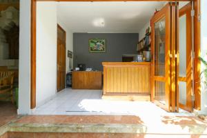 Kuchyň nebo kuchyňský kout v ubytování The Legian Mas Beach Inn