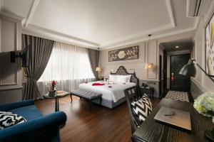 Ένα ή περισσότερα κρεβάτια σε δωμάτιο στο Imperial Hotel & Spa
