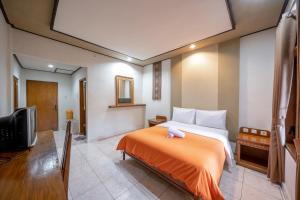 TV a/nebo společenská místnost v ubytování Bendesa Accommodation