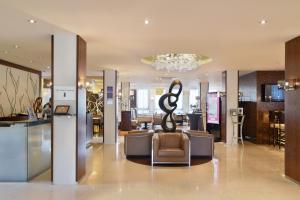 Posezení v ubytování ACHAT Hotel München Süd