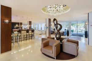 Posezení v ubytování ACHAT Hotel München Süd
