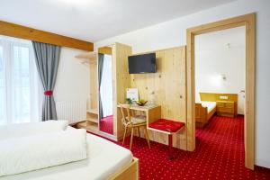Postel nebo postele na pokoji v ubytování Gasthof Walderhof