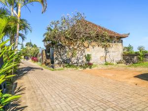 Aed väljaspool majutusasutust Sekar Arum Riverside Resort in Canggu