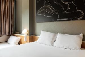 Postel nebo postele na pokoji v ubytování Ibis Salamanca