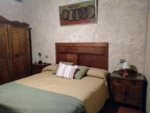 Un pat sau paturi într-o cameră la Casa Paulo