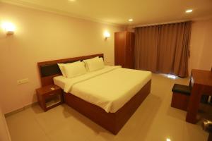 Luxora Hotel and Spa客房内的一张或多张床位