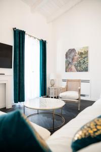TV a/nebo společenská místnost v ubytování Villa le Fontanelle