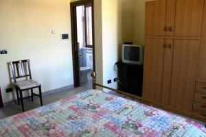 TV a/nebo společenská místnost v ubytování Bed and Breakfast Emilia
