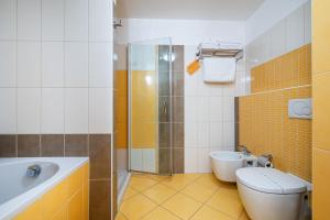 Uma casa de banho em Hotel Mlynska