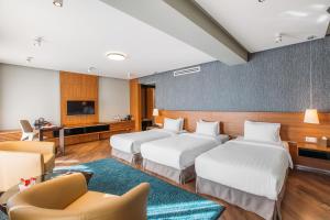 TV a/nebo společenská místnost v ubytování Golden Palace Hotel