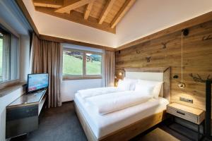Chalet´s Alpenjuwel客房内的一张或多张床位