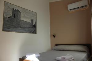 Postel nebo postele na pokoji v ubytování Room and Breakfast I Gemelli
