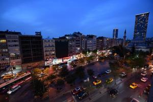 a city with a lot of traffic in the street at İskete Suit in Istanbul