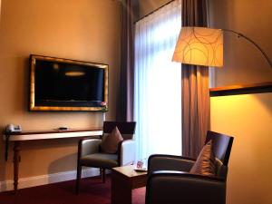 TV a/nebo společenská místnost v ubytování Hotel Kleiner Riesen
