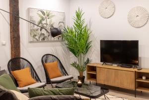 Telewizja i/lub zestaw kina domowego w obiekcie River Apartment in the heart of Bilbao EBI-01297