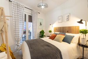 En eller flere senge i et værelse på River Apartment in the heart of Bilbao EBI-01297