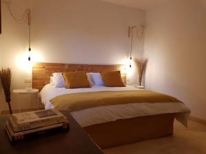 Ein Bett oder Betten in einem Zimmer der Unterkunft Trulli Laurus 600