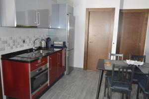 A kitchen or kitchenette at Apartamento Jazmín Még 13 kép