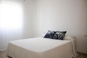 Cama o camas de una habitación en Campanar flat 2