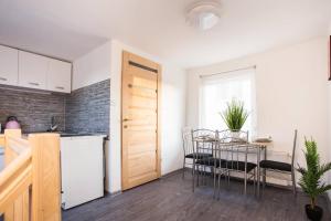 Kuchyňa alebo kuchynka v ubytovaní Csigaház Apartman